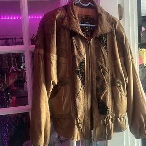 Genuine Leather Winlit London Jacket. Passed down to me, but it is not my style.